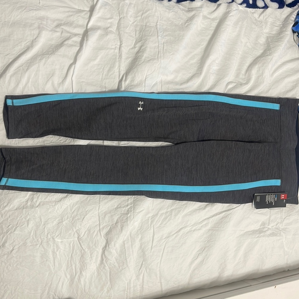 New with Tags, Under Armour Grey leggings, size medium.